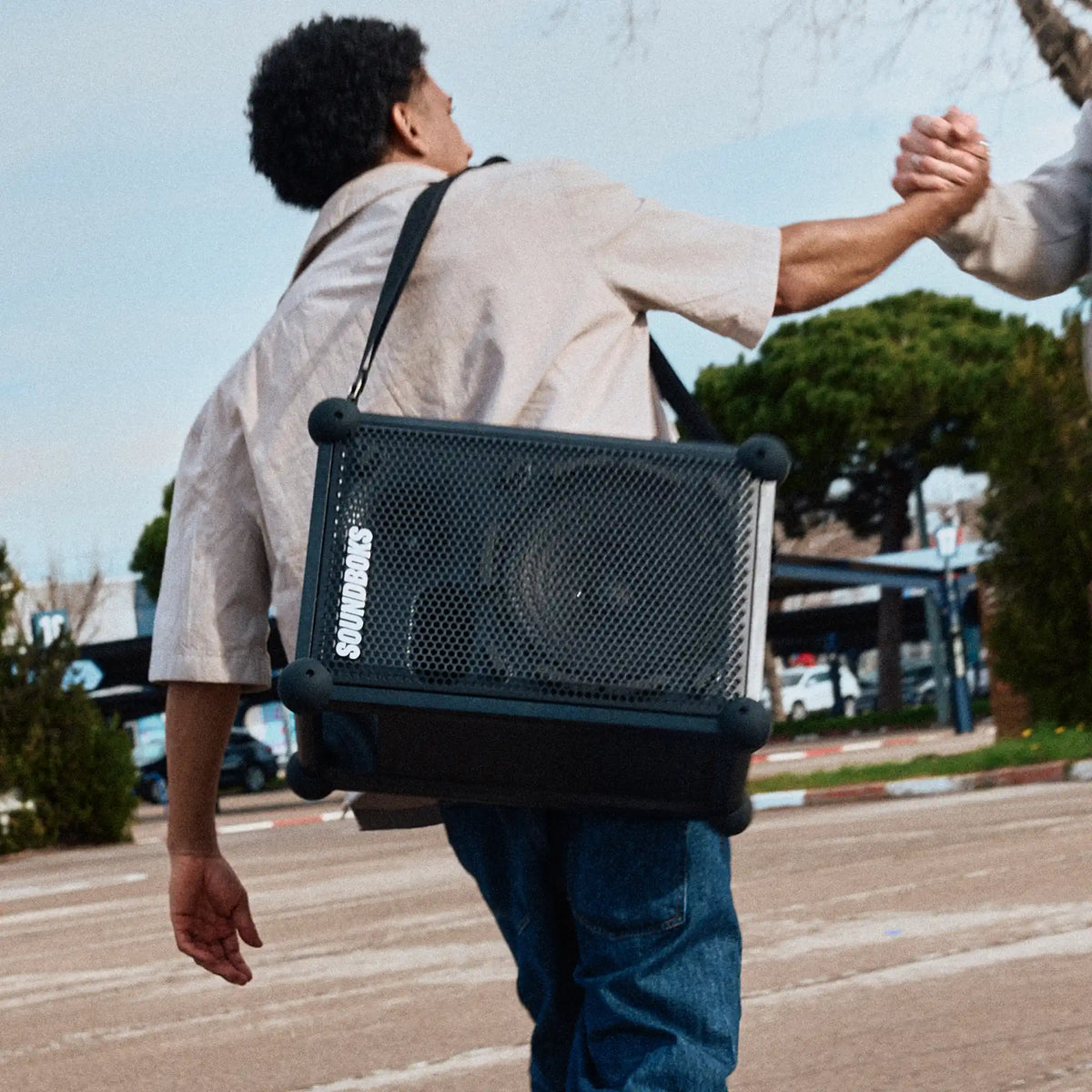 Soundboks Mix carried using The Strap 2.0